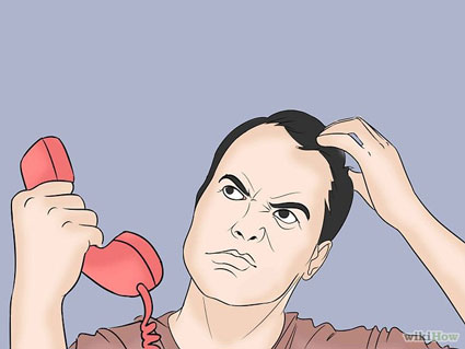 Confused man receiving prank phone call