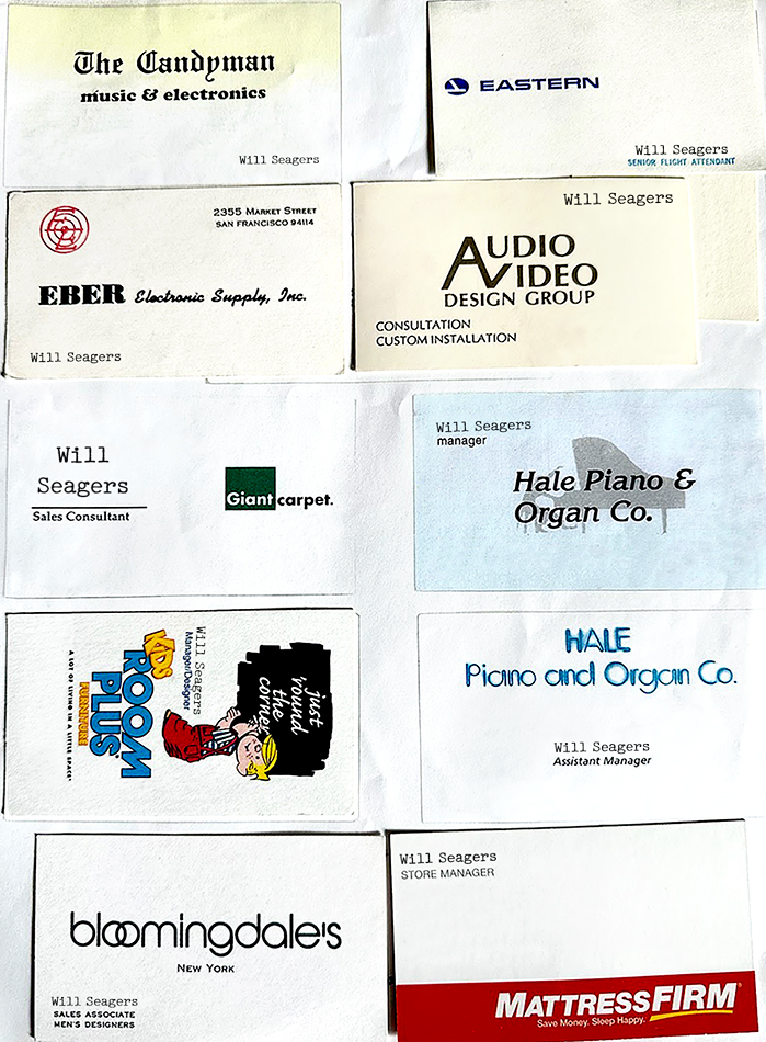 Sheet of Will's business cards from a number of jobs