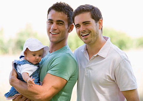 Wealthy gay married couple with a baby